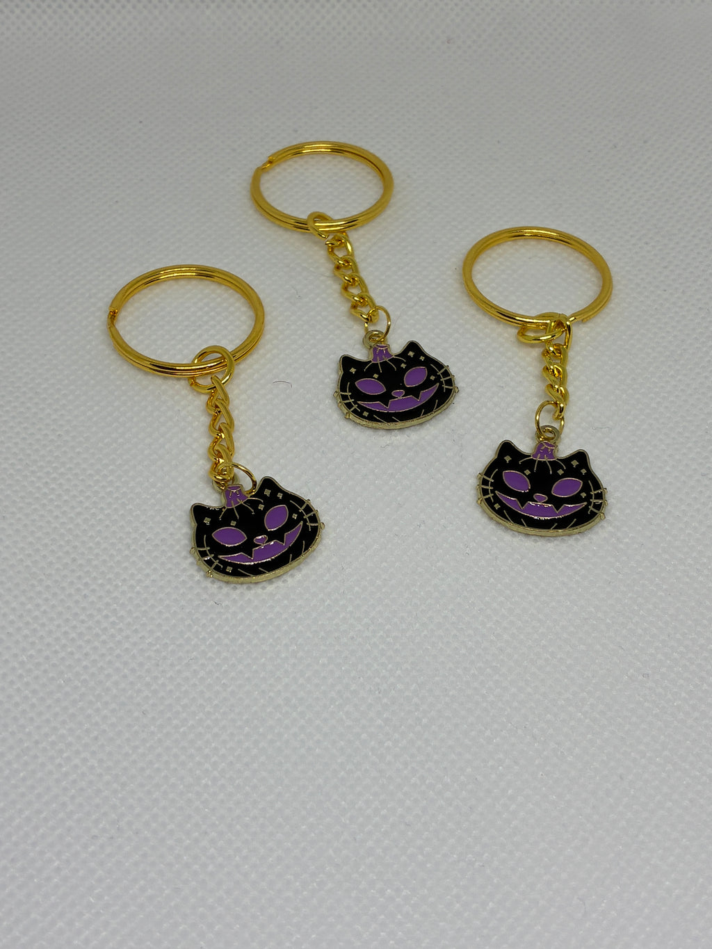 Purple Skull Cat Pumpkin Keychain