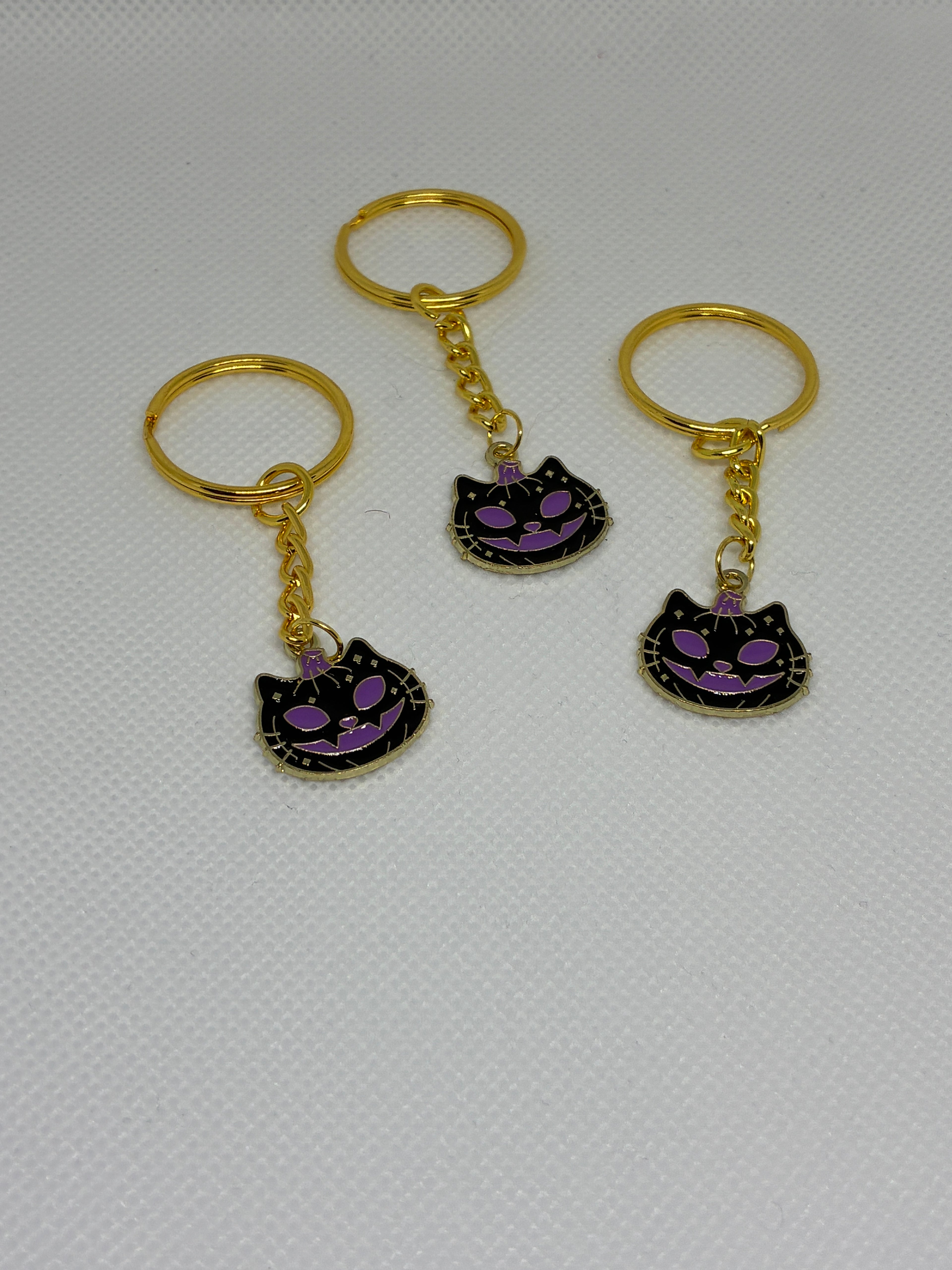 Purple Skull Cat Pumpkin Keychain