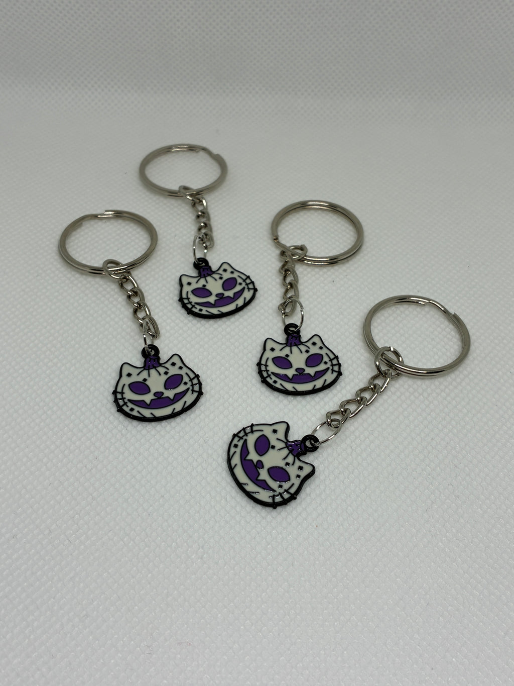 Purple Skeleton Cat Keychain