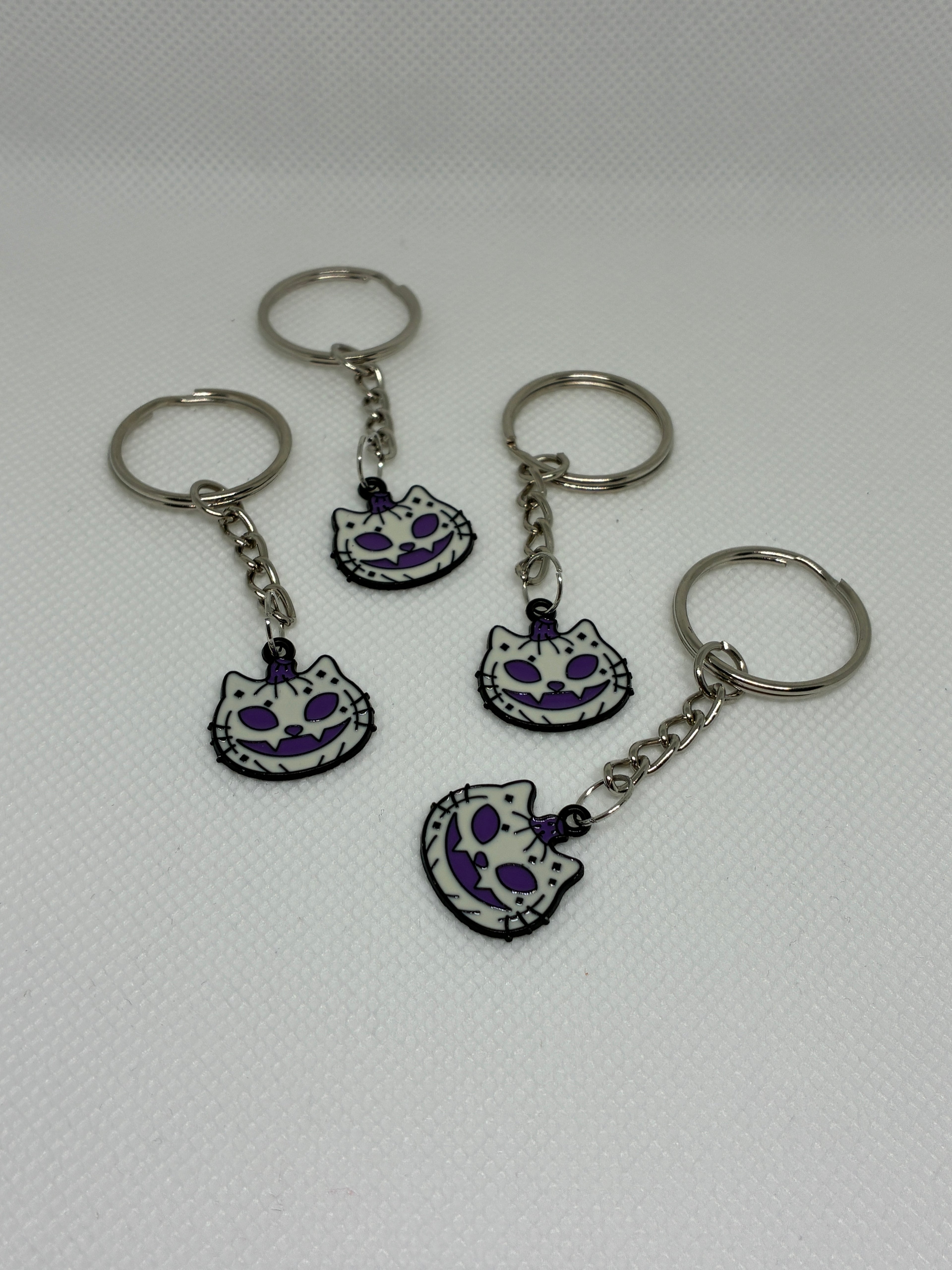 Purple Skeleton Cat Keychain
